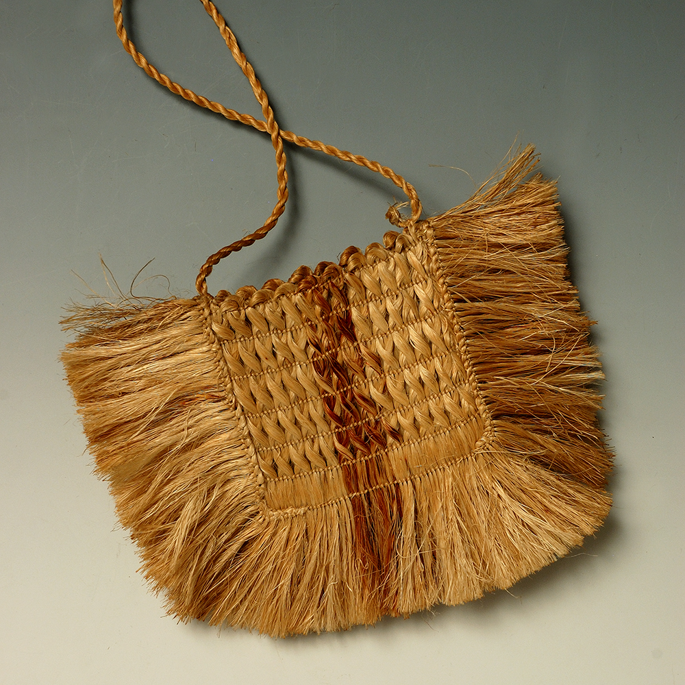 Kete, 19th C, Harakeke, Collection of Aratoi Wairarapa Museum of Art and History. Gift of Elizabeth Burden.